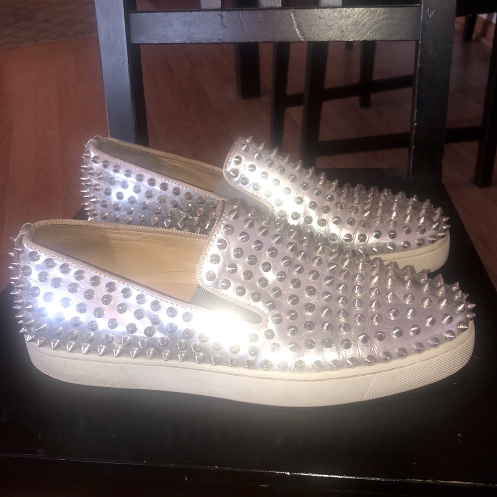 Christian louboutin spike boat slides size 43/10. Good condition.